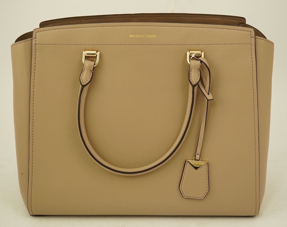 A Michael Kors taupe leather handbag